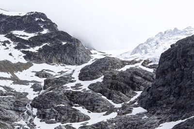 Scenic view of snow covered mountains