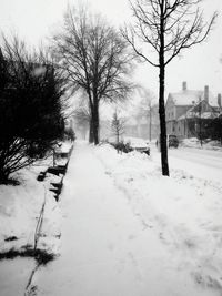 Snow covered landscape against sky