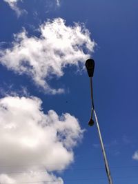 Low angle view of communications tower against sky