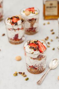 Close-up of dessert in jar on table