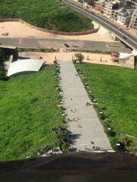 High angle view of road amidst trees in city