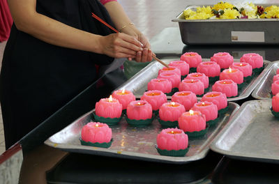 Midsection of man preparing food