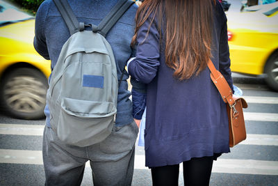 Rear view of friends on bus