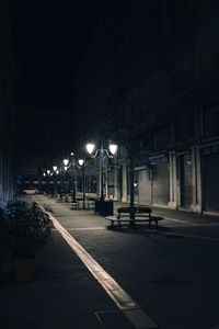 Illuminated street light at night