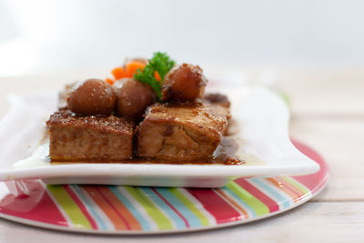 Close-up of dessert in plate on table