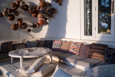 Sofa with pillows in café ,interior design,traditional cafe interior, outdoor sofa sets .