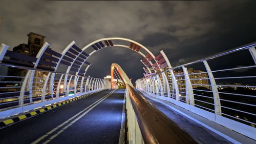 View of bridge against cloudy sky