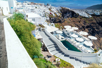 High angle view of cityscape by sea