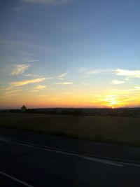 Scenic view of landscape at sunset
