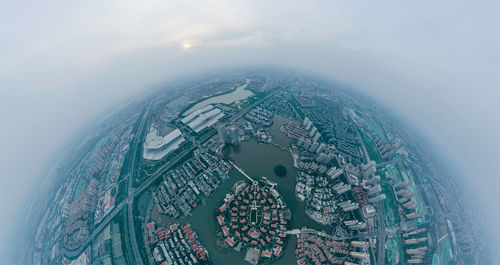 Spherical panoramic image of city buildings and sky