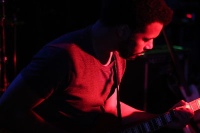 Young man playing guitar