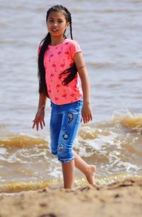 Portrait of happy girl on beach