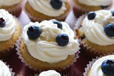 High angle view of blueberry cupcakes on table