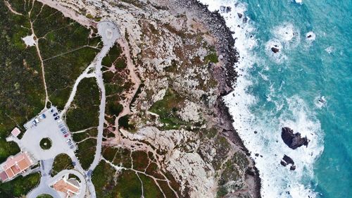 High angle view of snow on sea shore