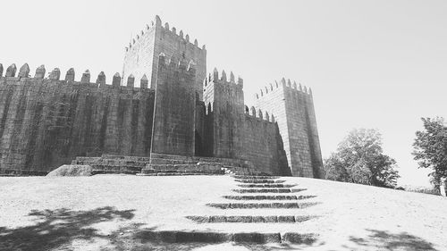 Low angle view of historical building in winter