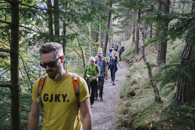 People walking in forest