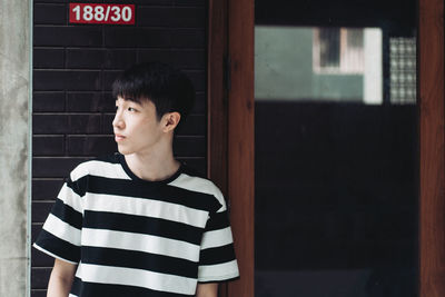 Portrait of a young man looking away