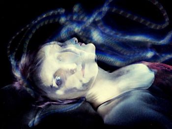 Close-up of over black background