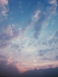 Scenic view of cloudy sky at sunset