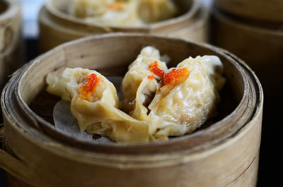 High angle view of food in dumplings in bamboo steamer