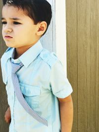 Close-up of boy standing outdoors