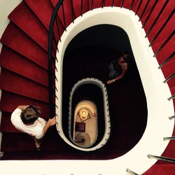 High angle view of people on spiral staircase