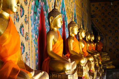 Statue of buddha outside building