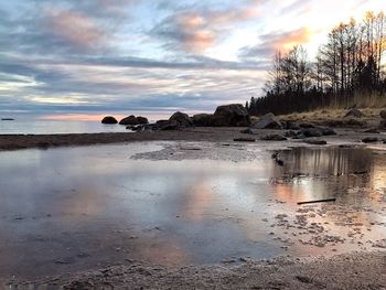 Scenic view of sea against sky at sunset