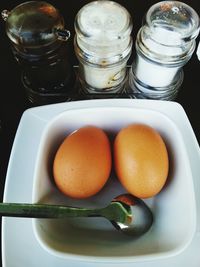 High angle view of eggs in plate