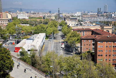 High angle view of street amidst buildings in city