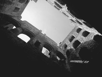 Low angle view of old building against sky