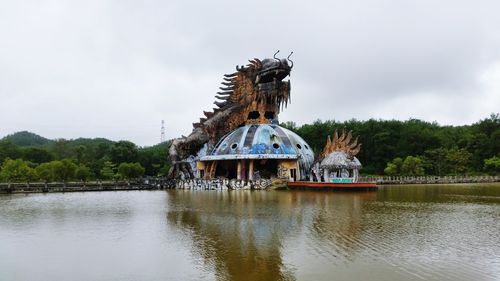 View of a lake with building in background