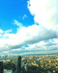 Aerial view of cityscape against sky