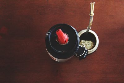 Close-up of red object on table