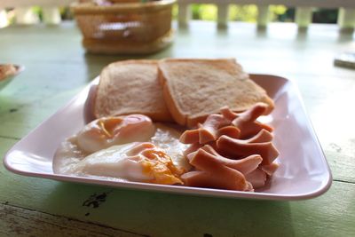 Close-up of breakfast served on table