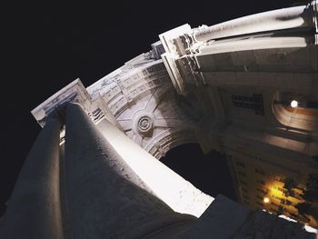 Low angle view of illuminated temple against sky at night