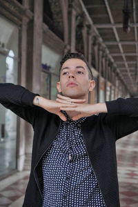 Portrait of young man looking away