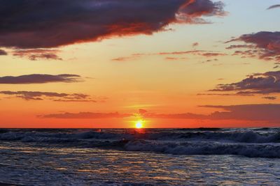 Scenic view of sea against sky during sunset