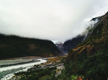 Scenic view of snow covered mountains