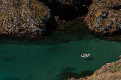High angle view of rocks in sea