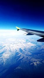 Aerial view of landscape with mountains in background