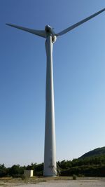 Traditional windmill against clear sky