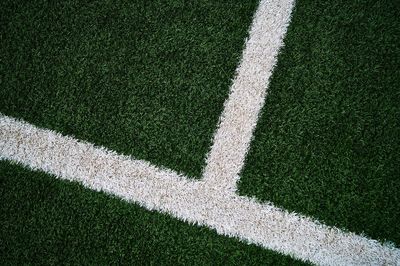 Shadow of person on soccer field