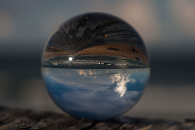 Close-up of crystal ball on table