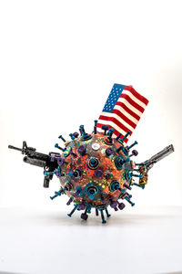 Close-up of toy flag against white background