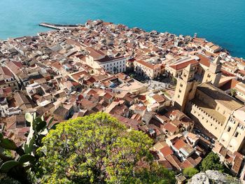 High angle view of town by sea