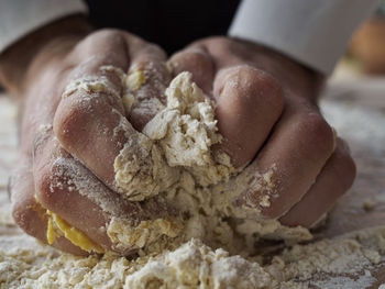 Close-up of hand holding ice cream