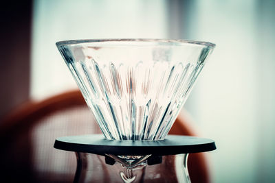 Close-up of empty glass on table