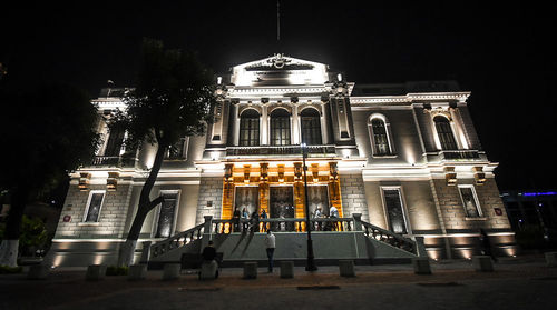 View of illuminated building at night