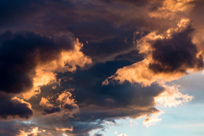 Low angle view of clouds in sky during sunset